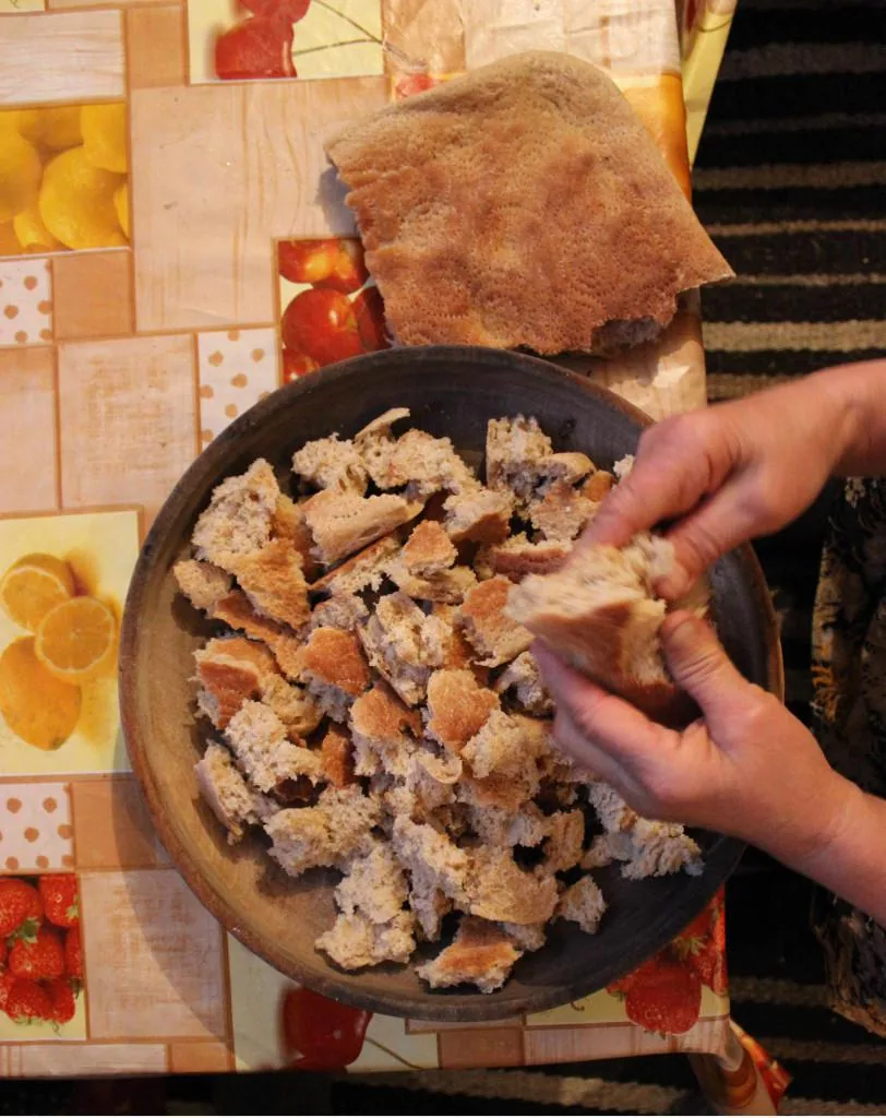 Preparing bread for Qurutob